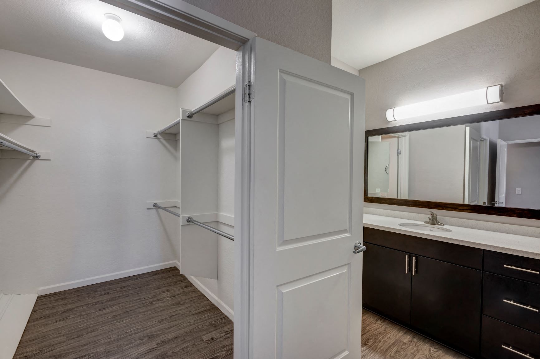 One Bedroom Apartments in Hancock Park, CA - Apartment Bathroom Vanity and Walk-In Closet