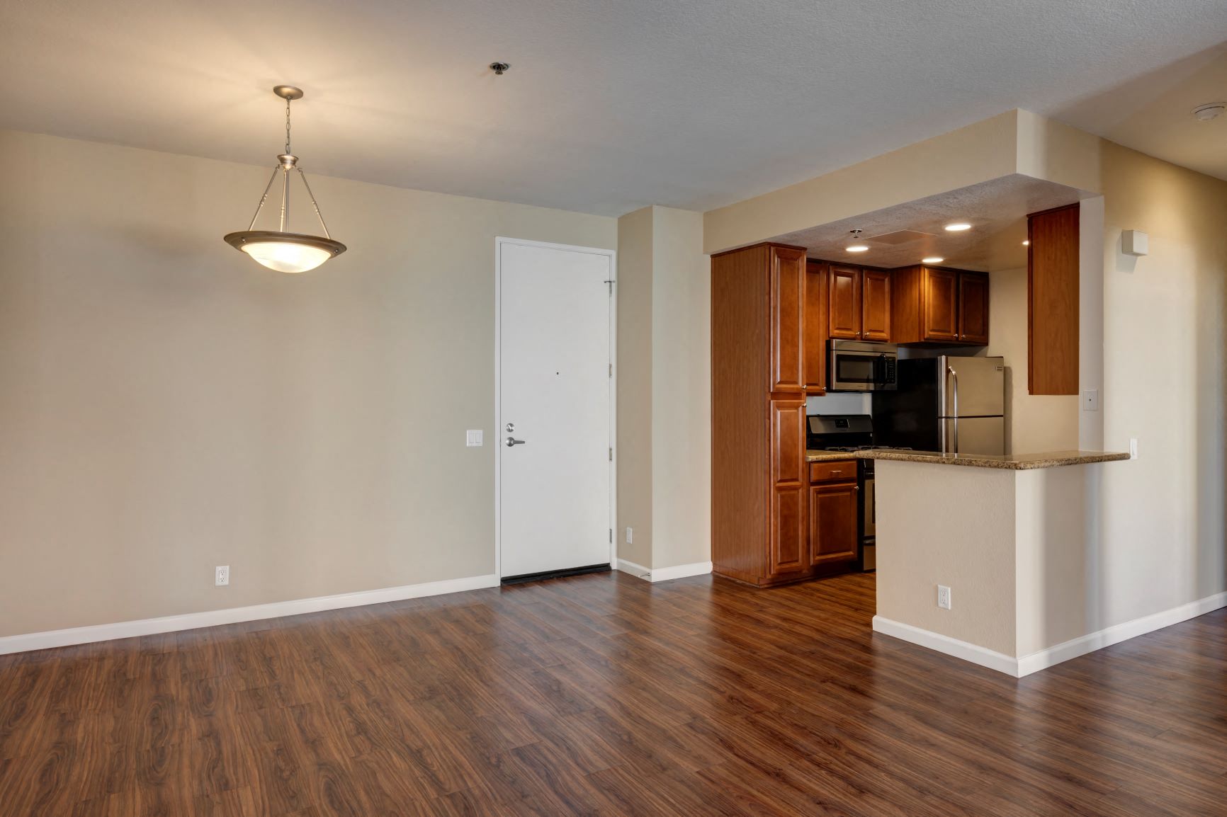 Two Bedroom Apartments in Hancock Park, CA - Apartment Entry, Kitchen and Dining Room