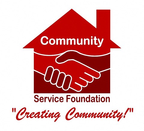 a red house with a handshake and the words community servicing foundation and creating community logo