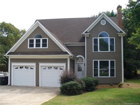 A two-car garage is attached to the house.