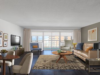 A living room with a brown leather couch, a wooden coffee table, and a flat-screen TV mounted on the wall at 10 West Apartments, Long Beach, NY