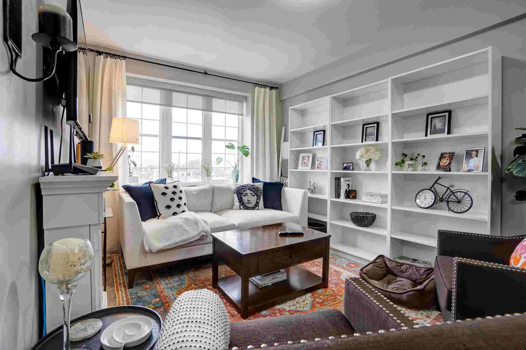 a living room with a couch and a table