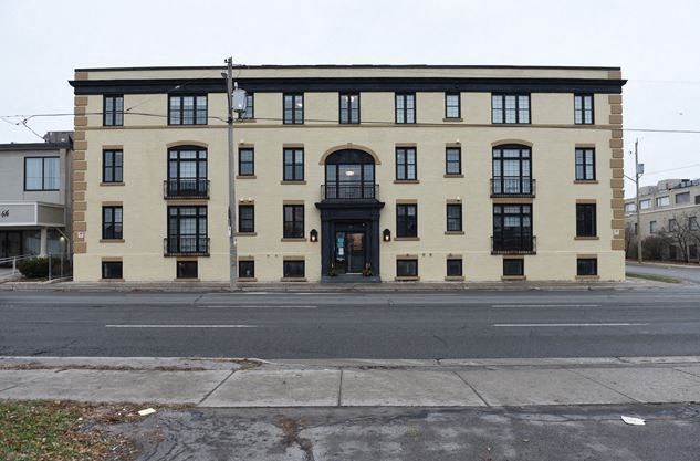 a large building on the side of a street