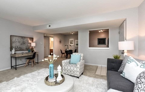 a living room with a couch and a table