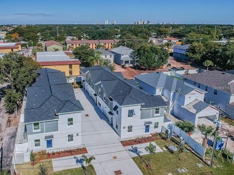 an aerial view of a group of houses in a neighborhood