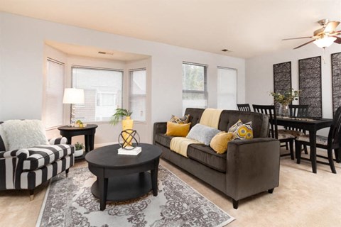 a living room with a couch and a table