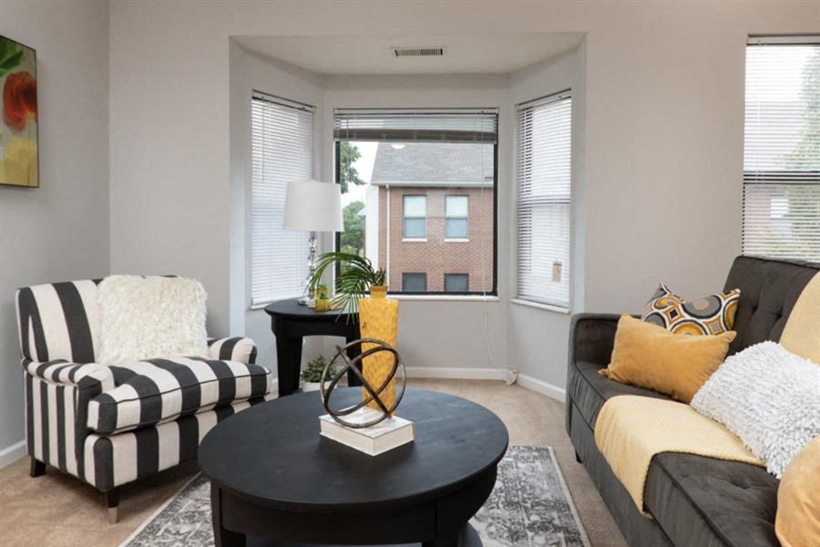 a living room with a couch and a table