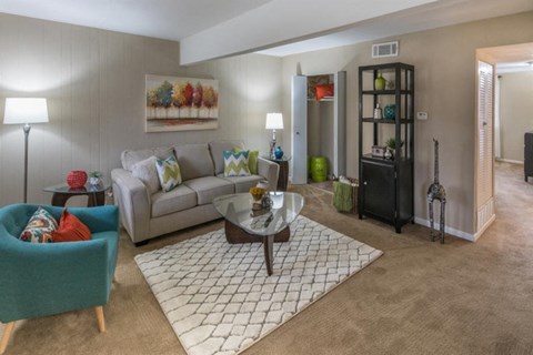 a living room with a couch and a table