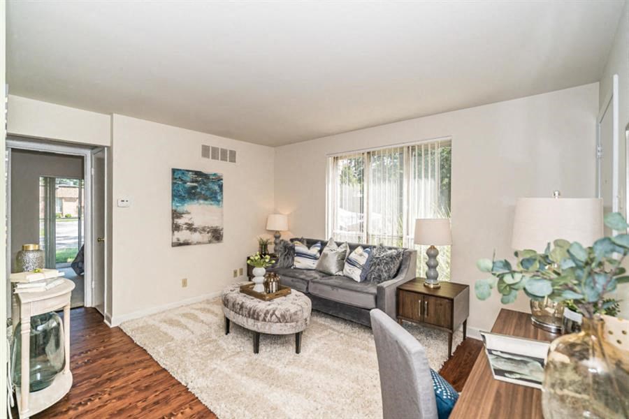 a living room with a couch and a table