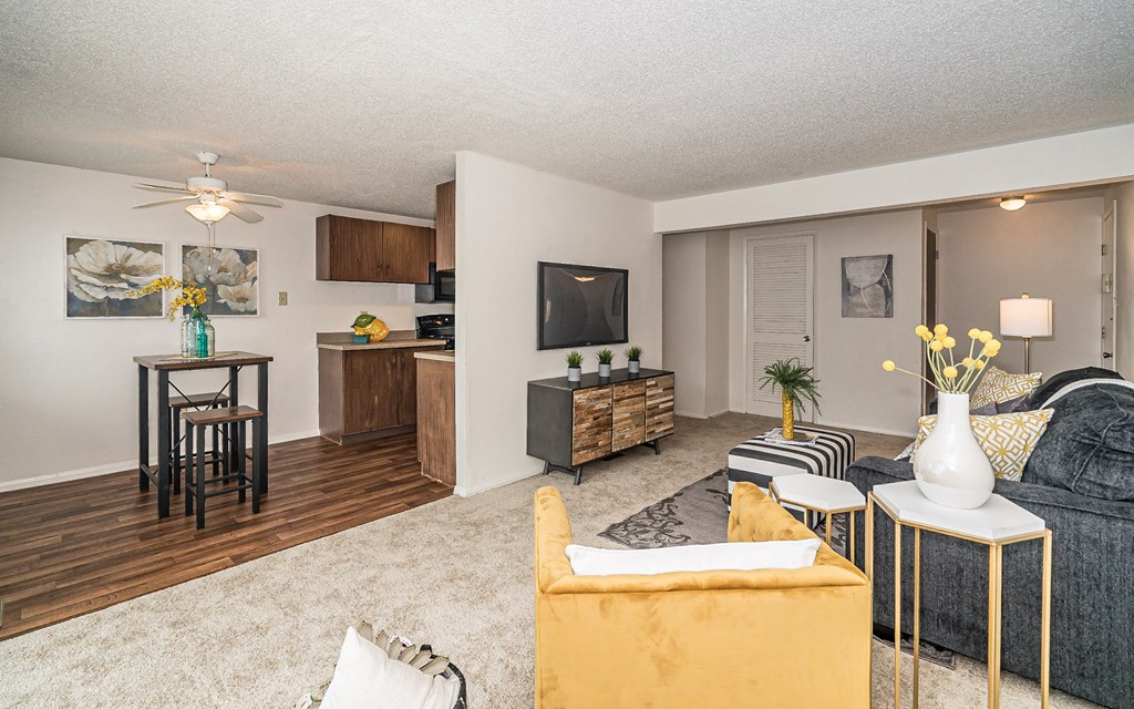 our apartments offer a living room and dining room with a tv