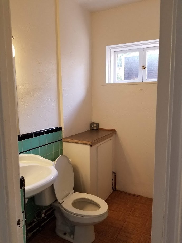 a small bathroom with a toilet and a sink