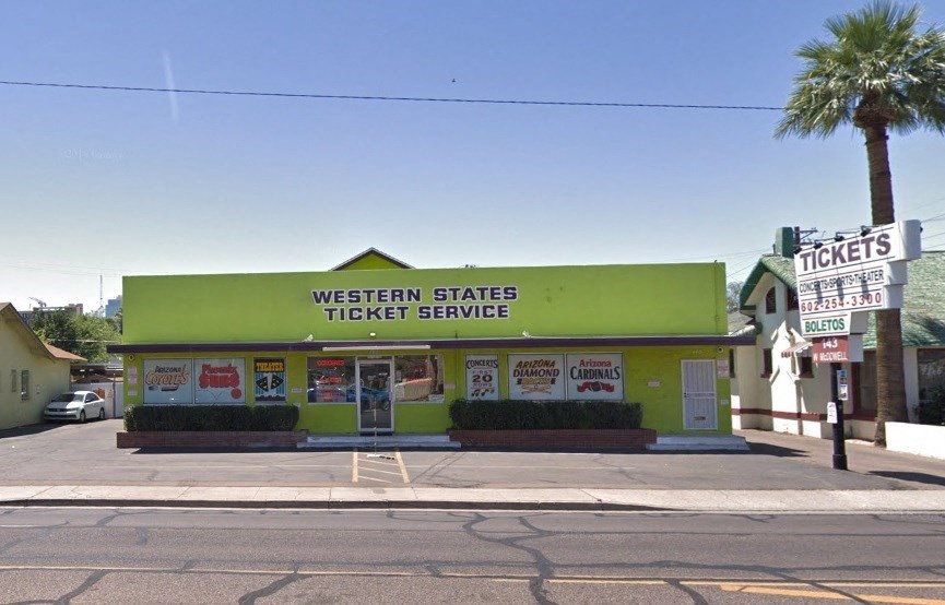 the front of the western state hotel venue on the corner of a street