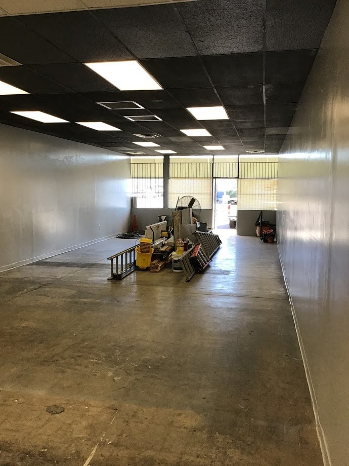 a large empty room with machinery in it