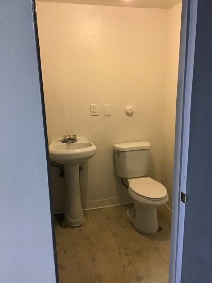 a small bathroom with a toilet and a sink
