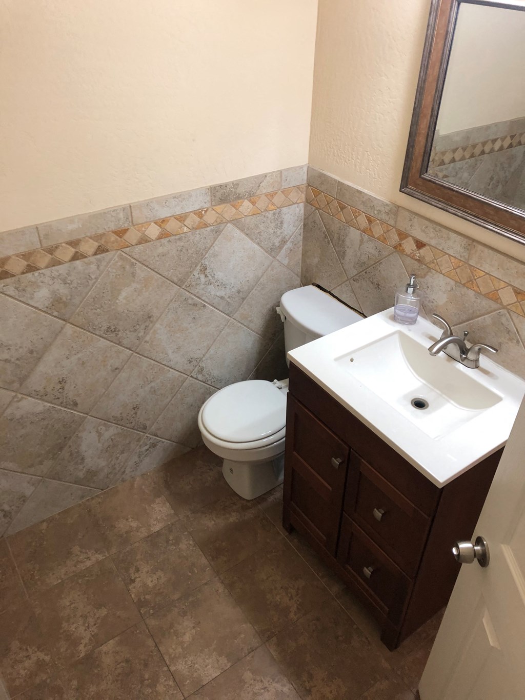 a small bathroom with a toilet and a sink