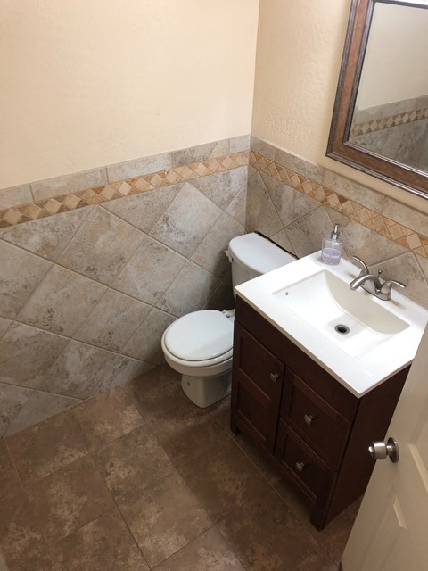 a small bathroom with a toilet and a sink