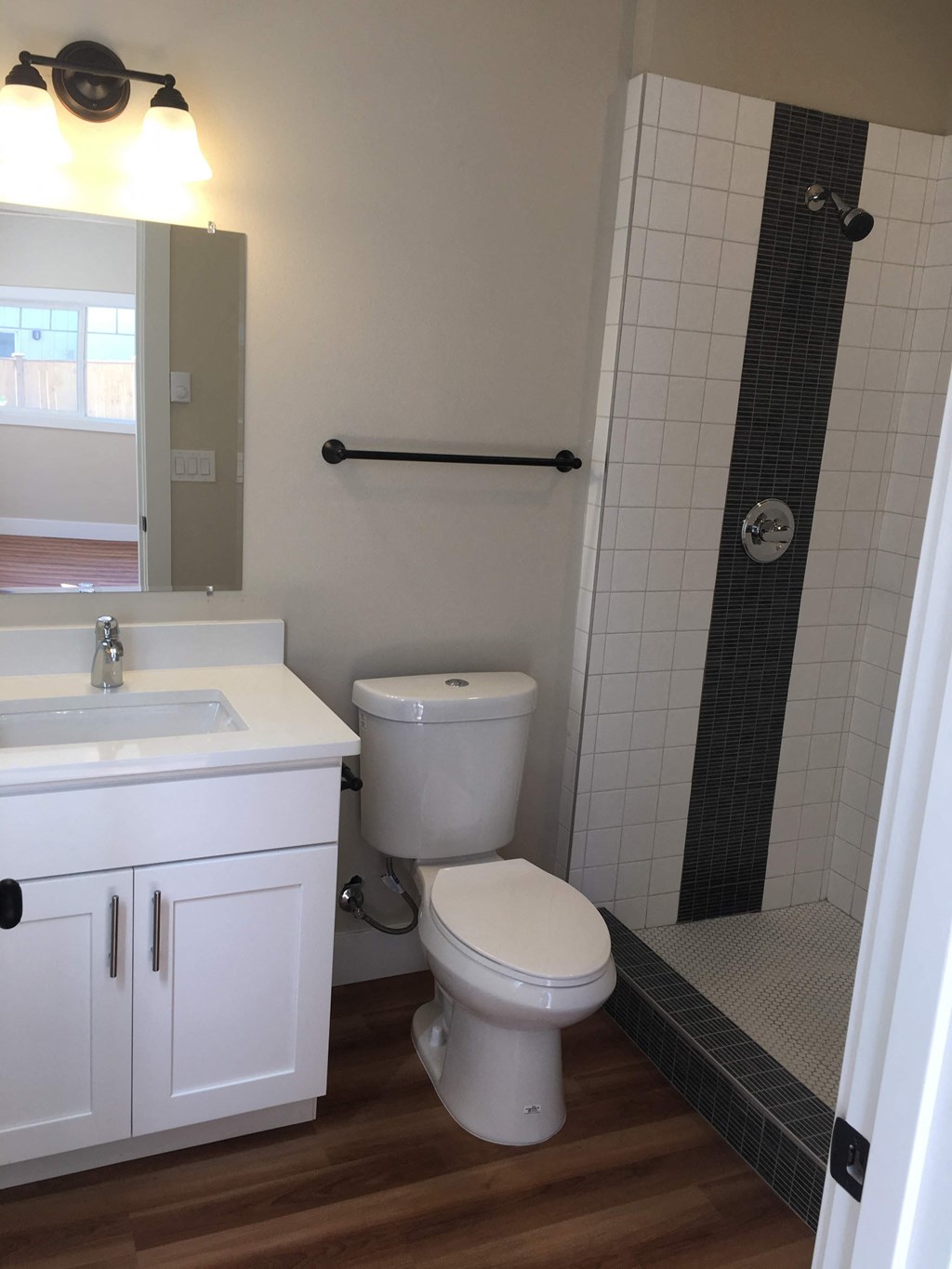 a small bathroom with a toilet and a shower