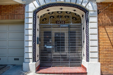 A gate with a number 1450 on it is closed.