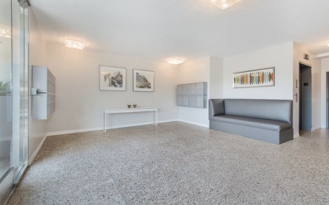 a living room with a couch and a table