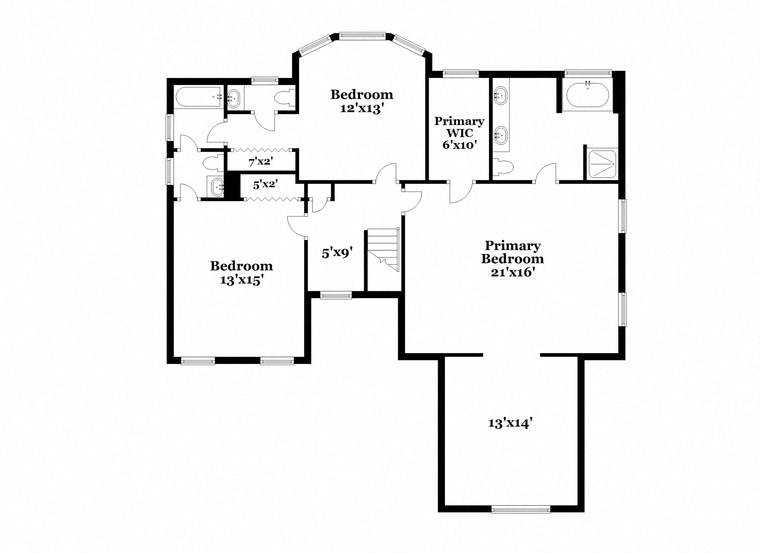 a floor plan of a house with two floors and a staircase