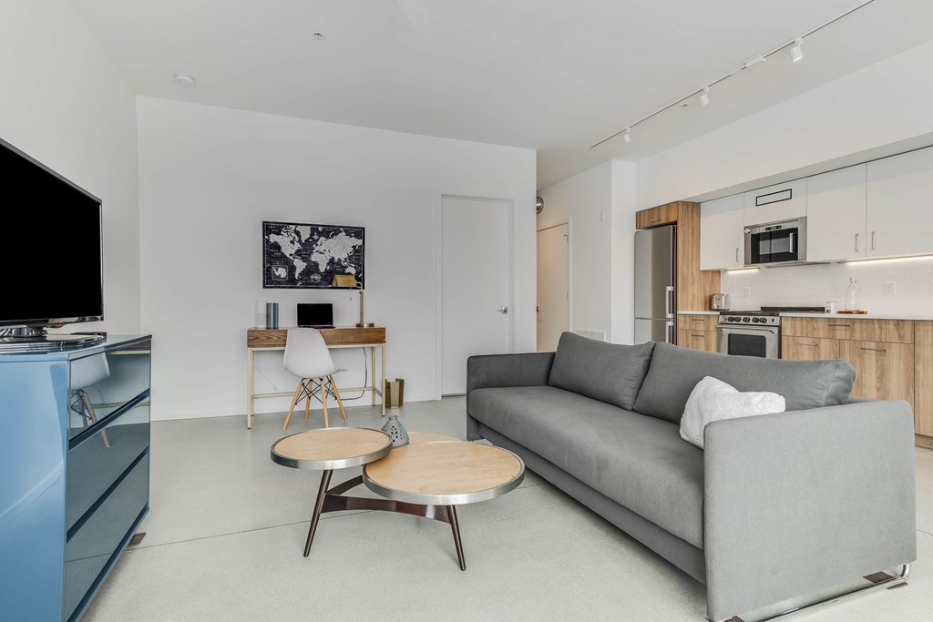 a living room with a couch and a coffee table