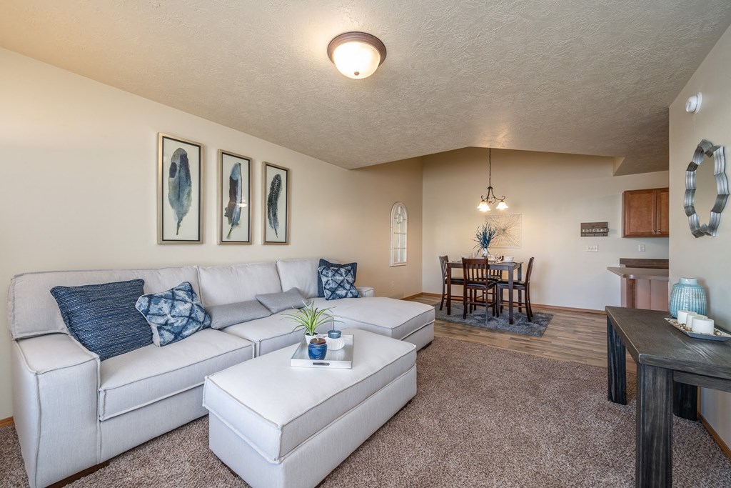 a living room with a couch and a table