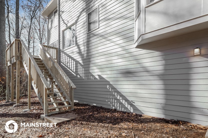the stairs to the side of a house