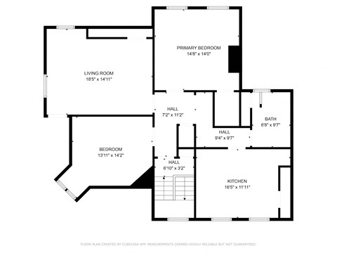 A black and white floor plan of a house with labeled rooms and dimensions.