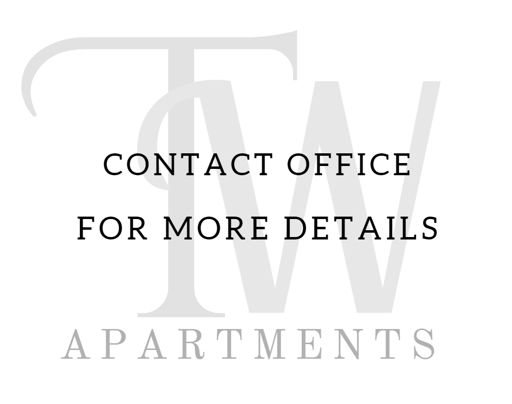 The apartment logo and Contact Us signage are prominently displayed, offering clear information to get in touch with the community.