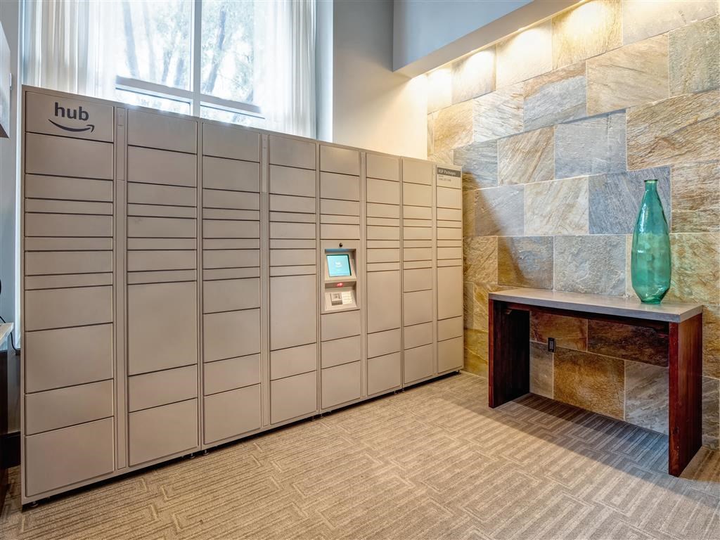 a set of lockers in a room with a table