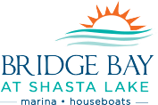 A logo for Bridge Bay at Shasta Lake featuring a sun and waves.