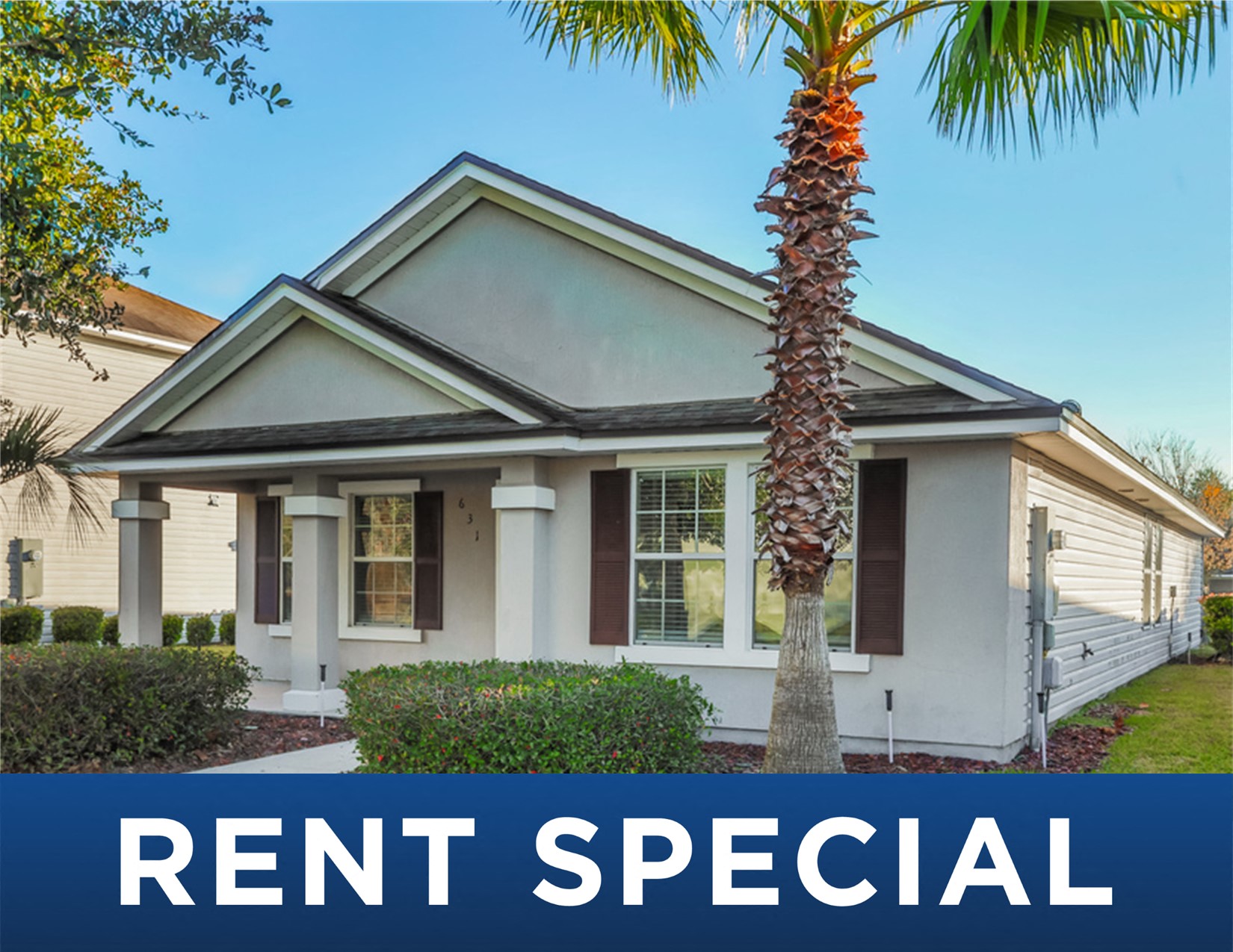 the real estate sign for a white house with a palm tree