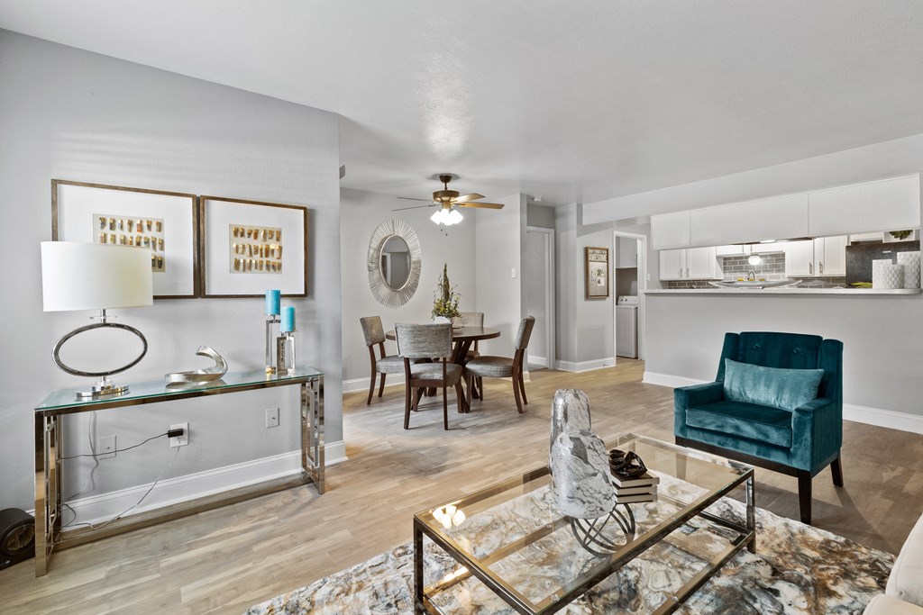 a living room with a dining room and a kitchen