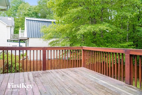 a wooden deck on top of a house