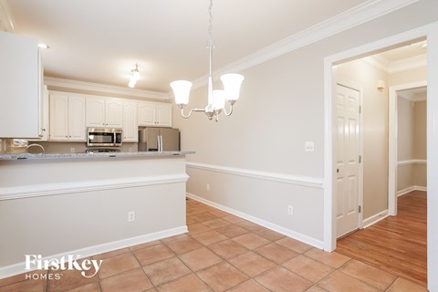 A kitchen with a counter and cabinets.