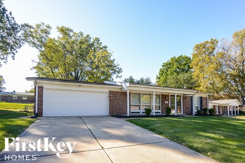 A house with a garage is for sale by FirstKey Homes.