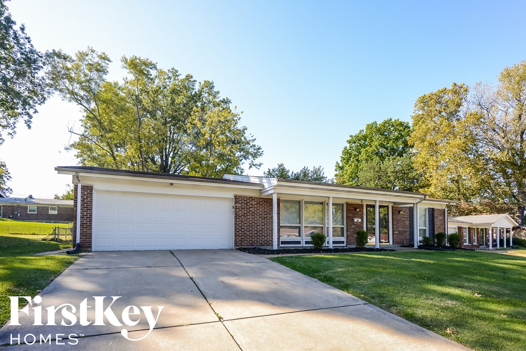 A house with a garage is for sale by FirstKey Homes.