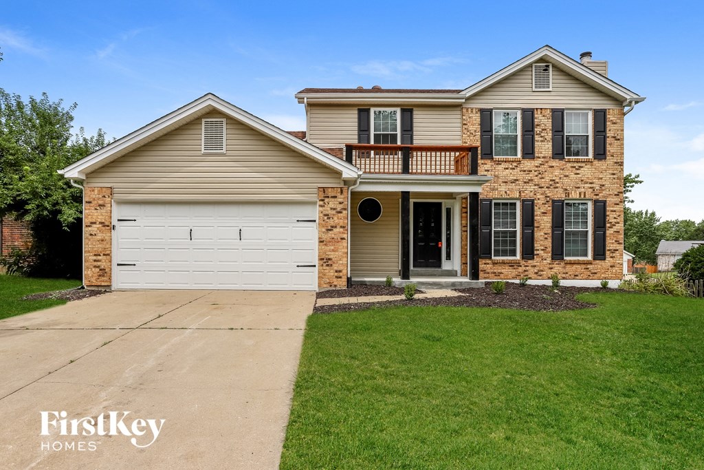 A two-story house with a garage is for sale by FirstKey Homes.