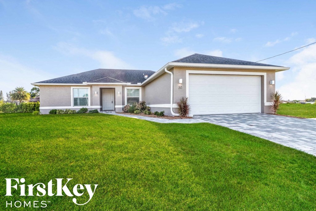 A house with a garage and a driveway is shown with the logo "FirstKey Homes" on the bottom left.