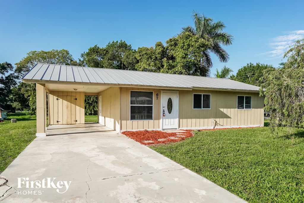 A house with a porch and a covered entrance.