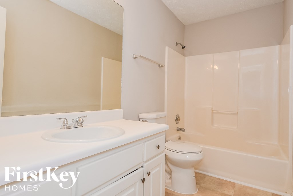 a bathroom with a sink and a toilet