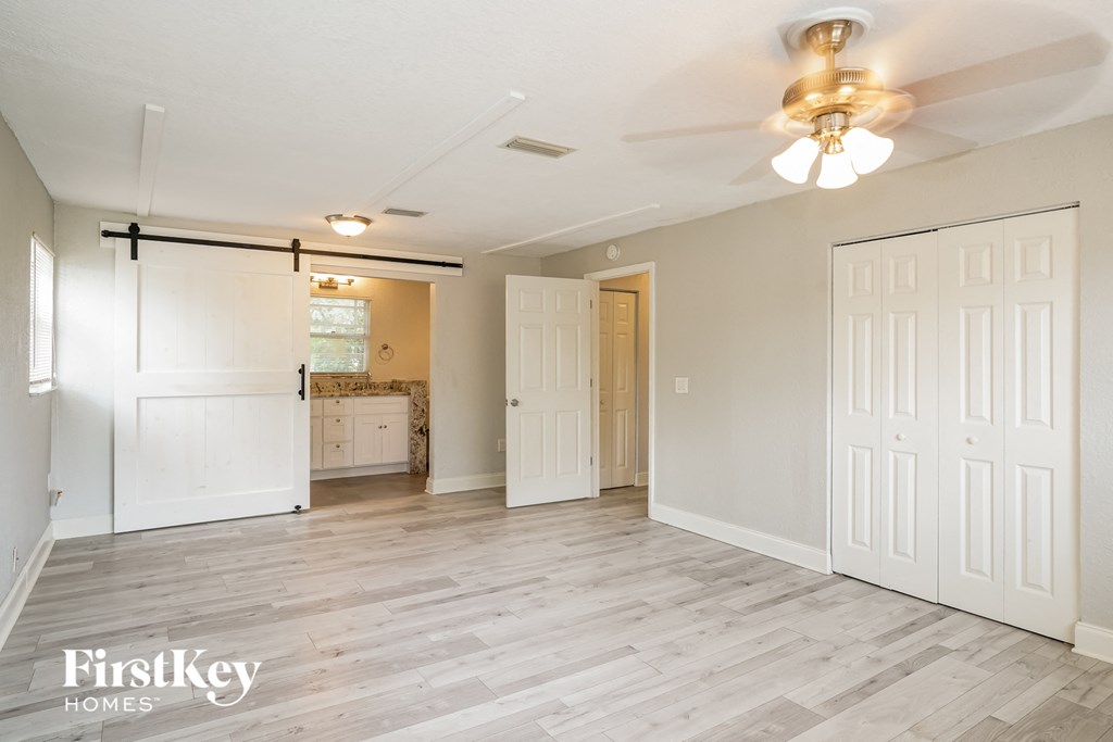 the living room is open to the kitchen and laundry room