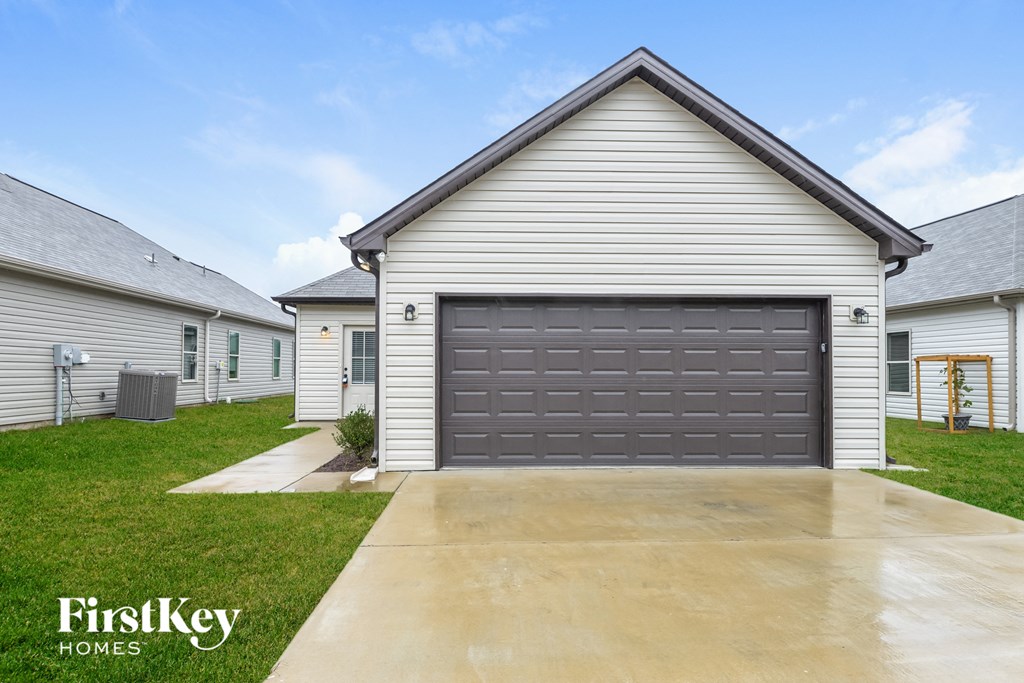 a garage door on the side of a house