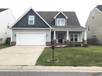 a home with a parking meter in the front yard