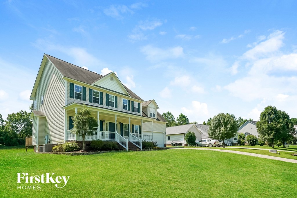 a house with a lawn in front of it