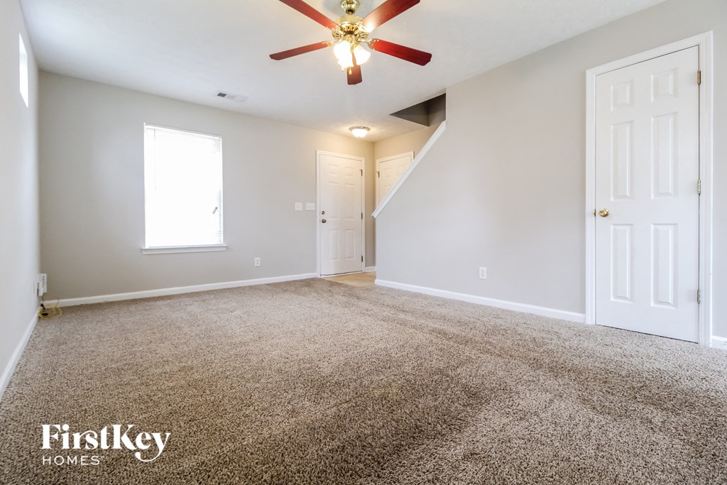 the spacious living room is clean and ready for you to use