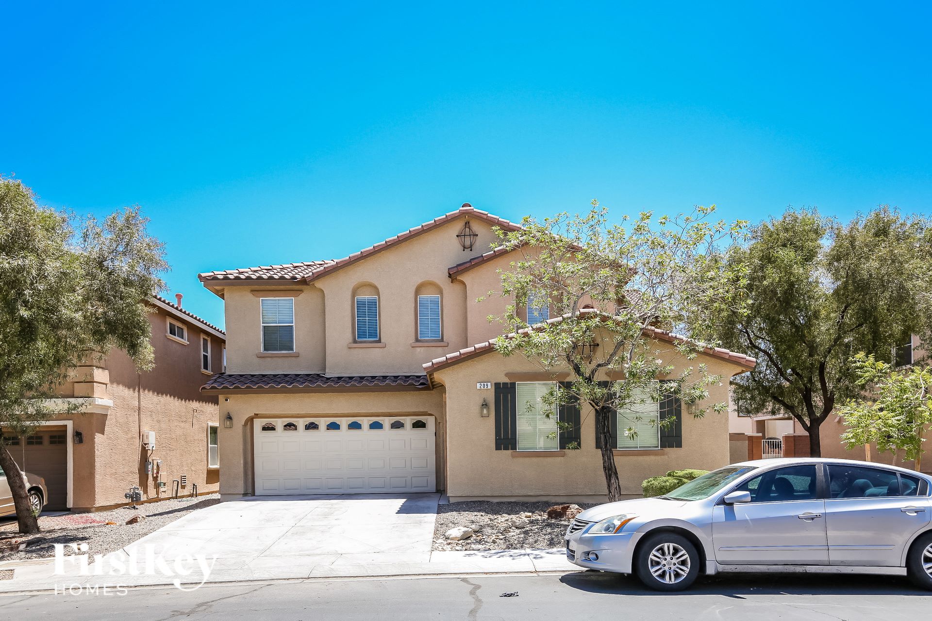 a house with a car parked in front of it