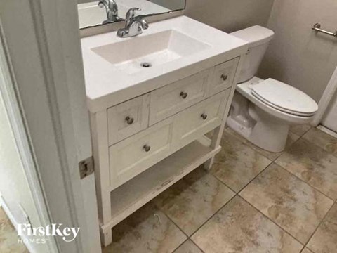a bathroom with a sink and a toilet