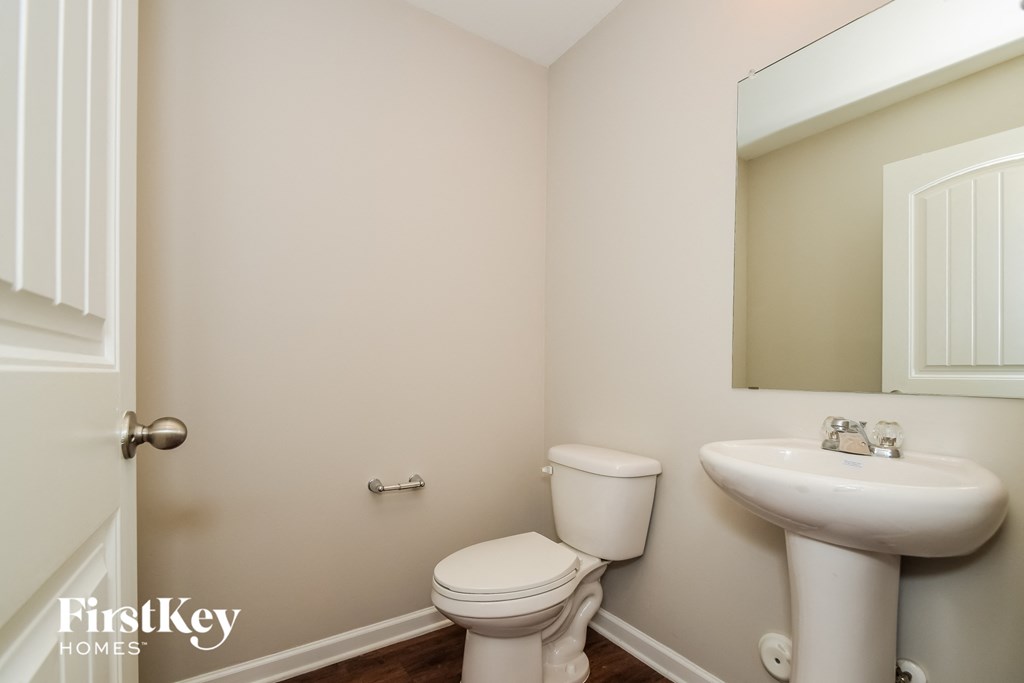a small bathroom with a toilet and a sink