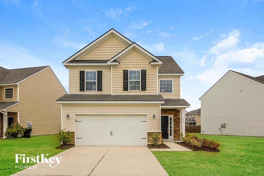 A house with a garage is shown in the image.